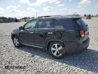 2012 Kia Sorento EX z VIN 5XYKUDA25CG305111, wystawiony jako Copart lot #54216645 z przebiegiem 111 841 mil mil oraz Szkoda całkowita • Salvage title. Historia ofert i sprzedaży dostępna na DreamBid. Obrazek 2.
