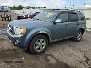 2010 Ford Escape Limited z VIN 1FMCU9EG1AKC28781, wystawiony jako Copart lot #61601725 z przebiegiem 99 969 mil mil oraz Szkoda całkowita • Salvage title. Historia ofert i sprzedaży dostępna na DreamBid. Obrazek 1.