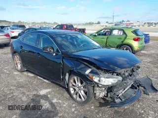 2017 Mazda Mazda6 Touring with VIN JM1GL1V52H1128973, listed as a IAAI auction lot 41661300 with 131,721 mi miles. Bid and sale history available at carsss.com. Image 1.