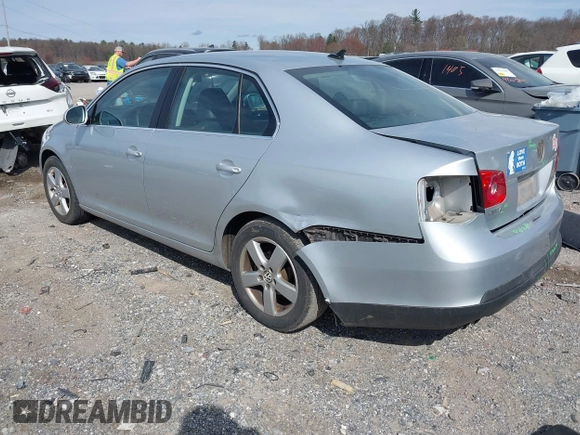 2009 Volkswagen Jetta Sedan SE with VIN 3VWRM71K59M131257, listed as a IAAI auction lot 41921694 with 190,389 mi miles. Bid and sale history available at carsss.com. Image 3.