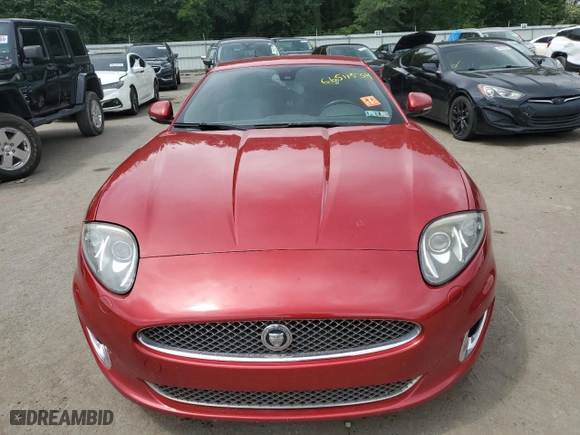 2013 Jaguar XK with VIN SAJWA4FB2DLB50515, listed as a Copart auction lot 66511554 with NaN miles and Salvage Title. Bid and sale history available at carsss.com. Image 5.