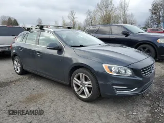 2015 Volvo V60 T5 Drive-E Premier z VIN YV140MEB2F1207148, wystawiony jako Copart lot #51272145 z przebiegiem 114 374 mil mil oraz Szkody całkowita. Historia ofert i sprzedaży dostępna na DreamBid. Obrazek 4.