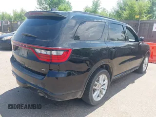 2023 Dodge Durango GT Plus with VIN 1C4RDJDGXPC688087, listed as a IAAI auction lot 42685018 with 58,999 mi miles and . Bid and sale history available at DreamBid. Image 4.