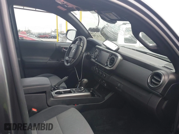 2021 Toyota Tacoma SR z VIN 3TMCZ5AN9MM397611, wystawiony jako IAAI lot #41467705 z przebiegiem 65 191 mil mil oraz . Historia ofert i sprzedaży dostępna na DreamBid. Obrazek 5.