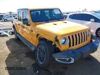 2021 Jeep Gladiator Overland z VIN 1C6HJTFG3ML552660, wystawiony jako IAAI lot #41636232 z przebiegiem 37 769 mil mil oraz . Historia ofert i sprzedaży dostępna na DreamBid. Obrazek 1.