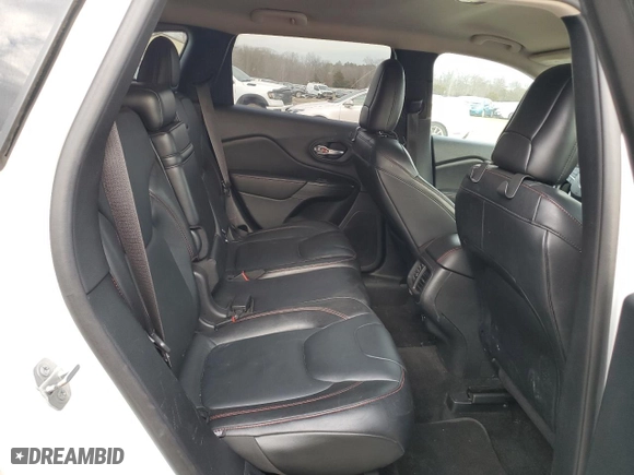 2015 Jeep Cherokee Trailhawk with VIN 1C4PJMBB1FW528766, listed as a Copart auction lot 46879355 with 248,676 mi miles and Salvage Title. Bid and sale history available at carsss.com. Image 11.