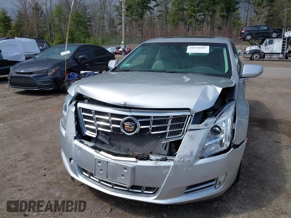 2013 Cadillac XTS Luxury z VIN 2G61P5S33D9170453, wystawiony jako IAAI lot #41928607 z przebiegiem 68 094 mil mil oraz . Historia ofert i sprzedaży dostępna na DreamBid. Obrazek 6.