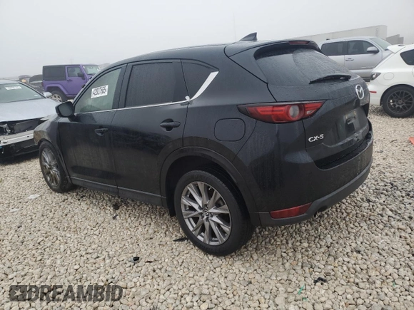 2020 Mazda CX-5 Grand Touring with VIN JM3KFADM9L1783156, listed as a Copart auction lot 42827565 with Not Provided miles and Salvage Title. Bid and sale history available at DreamBid. Image 2.
