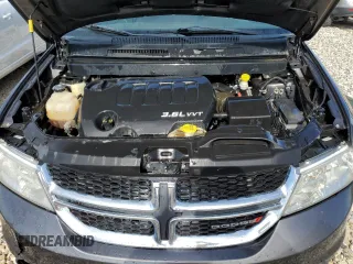 2015 Dodge Journey SXT with VIN 3C4PDDBG2FT684520, listed as a Copart auction lot 58835535 with 101,763 mi miles and Salvage title. Bid and sale history available at DreamBid. Image 11.