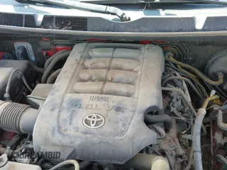 2012 Toyota Tundra z VIN 5TFUM5F13CX039048, wystawiony jako IAAI lot #43084333 z przebiegiem 56 487 mil mil oraz . Historia ofert i sprzedaży dostępna na DreamBid. Obrazek 21.