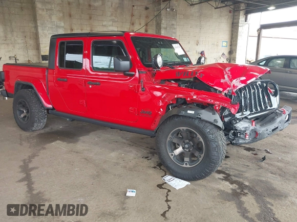 2021 Jeep Gladiator Willys with VIN 1C6HJTAG7ML602130, listed as a IAAI auction lot 42161745 with 49,576 mi miles and . Bid and sale history available at DreamBid. Image 1.