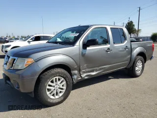 2016 Nissan Frontier SV with VIN 1N6AD0ER3GN729992, listed as a Copart auction lot 61014915 with 102,422 mi miles and Salvage title. Bid and sale history available at DreamBid. Image 1.