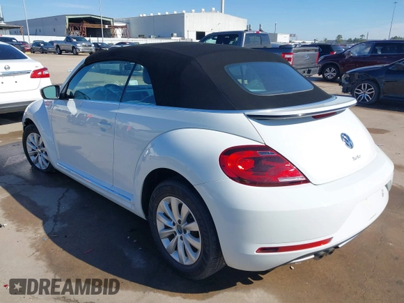2019 Volkswagen Beetle S with VIN 3VW5DAAT0KM507437, listed as a IAAI auction lot 41380821 with 28,010 mi miles and . Bid and sale history available at DreamBid. Image 3.