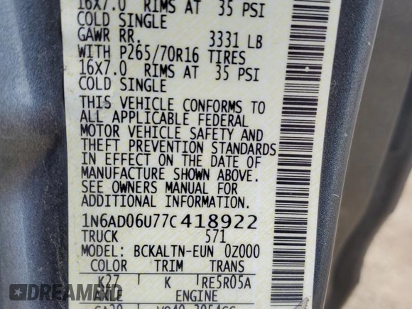 2007 Nissan Frontier SE z VIN 1N6AD06U77C418922, wystawiony jako Copart lot #56603015 z przebiegiem 354 484 mil mil oraz Szkoda całkowita • Salvage title. Historia ofert i sprzedaży dostępna na DreamBid. Obrazek 13.
