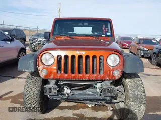 2014 Jeep Wrangler Rubicon with VIN 1C4BJWCG8EL185597, listed as a IAAI auction lot 41914489 with 85,545 mi miles and . Bid and sale history available at DreamBid. Image 12.