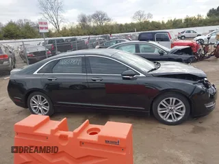 2014 Lincoln MKZ with VIN 3LN6L2G90ER832698, listed as a IAAI auction lot 41887879 with 141,798 mi miles and . Bid and sale history available at DreamBid. Image 13.