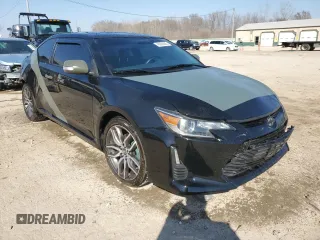 2016 Scion tC z VIN JTKJF5C79GJ014274, wystawiony jako Copart lot #49000685 z przebiegiem 83 607 mil mil oraz Szkoda całkowita • Salvage title. Historia ofert i sprzedaży dostępna na DreamBid. Obrazek 4.