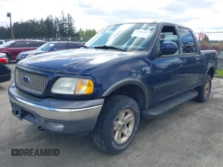 2003 Ford F-150 XLT with VIN 1FTRW08L93KD64270, listed as a IAAI auction lot 42088905 with 181,528 mi miles. Bid and sale history available at carsss.com. Image 2.