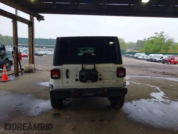 2018 Jeep Wrangler Unlimited Sahara with VIN 1C4HJXEG3JW116404, listed as a IAAI auction lot 42152506 with 57,727 mi miles and . Bid and sale history available at DreamBid. Image 16.