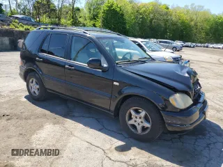 2001 Mercedes-Benz M-Class with VIN 4JGAB54E61A232157, listed as a Copart auction lot 53482584 with 137,549 mi miles and Salvage Title. Bid and sale history available at carsss.com. Image 4.