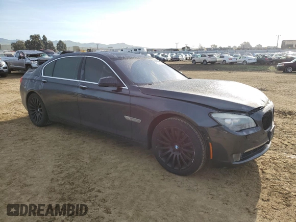 2012 BMW 7 Series 750Li with VIN WBAKB8C52CDW84794, listed as a Copart auction lot 49874315 with 118,725 mi miles and Salvage Title. Bid and sale history available at carsss.com. Image 4.