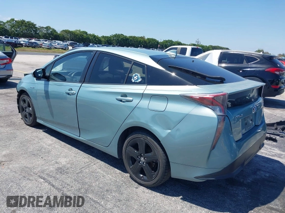 2016 Toyota Prius Four z VIN JTDKARFU0G3016597, wystawiony jako IAAI lot #42034214 z przebiegiem 125 799 mil mil oraz . Historia ofert i sprzedaży dostępna na DreamBid. Obrazek 3.
