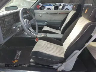 1987 Buick Regal with VIN 1G4GJ1174HP443571, listed as a Copart auction lot 83341634 with 53,709 mi miles and Salvage Title. Bid and sale history available at DreamBid. Image 7.