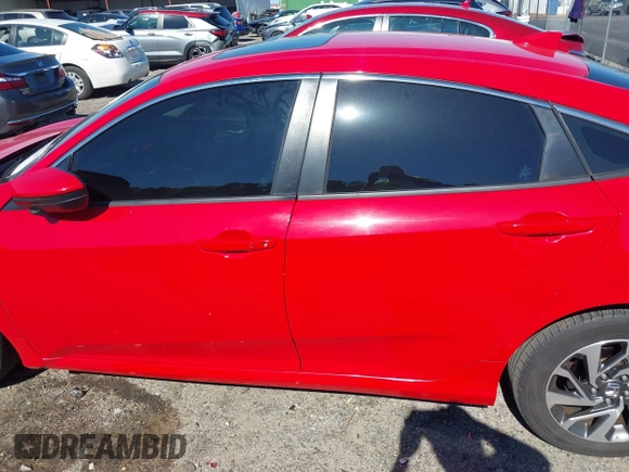 2017 Honda Civic EX z VIN 2HGFC2F77HH535613, wystawiony jako IAAI lot #42208566 z przebiegiem 121 024 mil mil oraz . Historia ofert i sprzedaży dostępna na DreamBid. Obrazek 14.