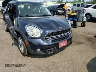 2015 MINI Countryman S z VIN WMWZC5C54FWP48739, wystawiony jako Copart lot #58197575 z przebiegiem 119 816 mil mil oraz Szkoda całkowita • Salvage title. Historia ofert i sprzedaży dostępna na DreamBid. Obrazek 14.