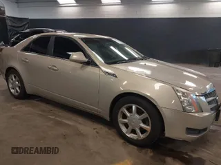 2009 Cadillac CTS AWD w/1SA with VIN 1G6DG577590157729, listed as a IAAI auction lot 41878455 with 169,139 mi miles. Bid and sale history available at carsss.com. Image 1.
