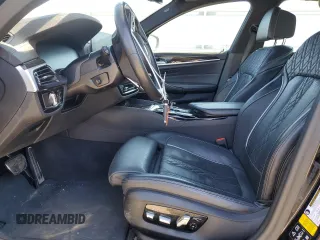 2020 BMW 5 Series M550i xDrive z VIN WBAJS7C02LCD42698, wystawiony jako Copart lot #48229785 z przebiegiem 51 896 mil mil oraz Szkoda całkowita • Salvage title. Historia ofert i sprzedaży dostępna na DreamBid. Obrazek 7.