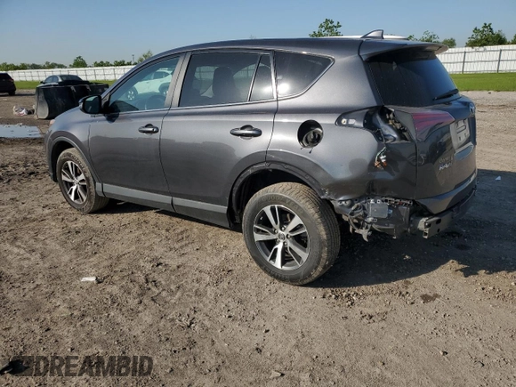 2018 Toyota RAV4 XLE with VIN 2T3WFREV0JW517488, listed as a Copart auction lot 51000975 with 68,105 mi miles and Salvage title. Bid and sale history available at DreamBid. Image 2.