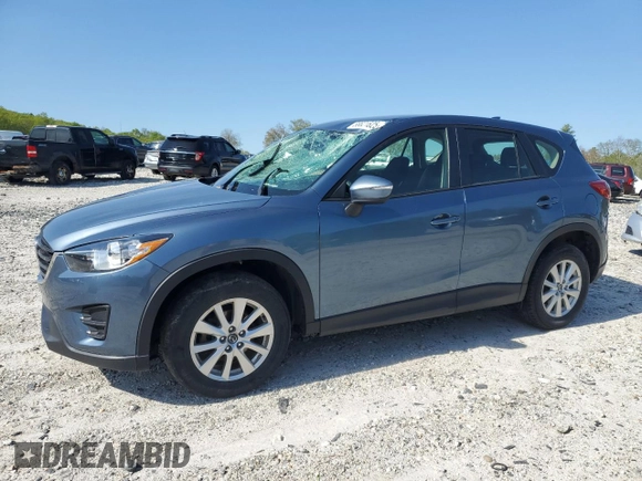 2016 Mazda CX-5 Sport with VIN JM3KE4BY8G0745522, listed as a Copart auction lot 56621825 with 98,757 mi miles and Salvage title. Bid and sale history available at DreamBid. Image 1.