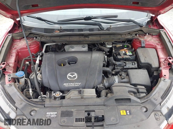 2016 Mazda CX-5 Touring z VIN JM3KE2CY3G0894441, wystawiony jako IAAI lot #41508767 z przebiegiem 88 554 mil mil oraz . Historia ofert i sprzedaży dostępna na DreamBid. Obrazek 10.