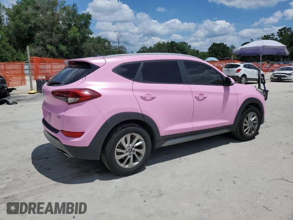 2017 Hyundai Tucson Value with VIN KM8J33A25HU332514, listed as a Copart auction lot 56958845 with 99,818 mi miles and Salvage title. Bid and sale history available at DreamBid. Image 3.