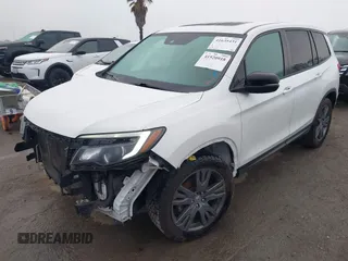 2021 Honda Passport EX-L with VIN 5FNYF7H58MB008459, listed as a IAAI auction lot 41920918 with 72,353 mi miles and . Bid and sale history available at carsss.com. Image 2.