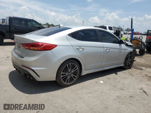 2018 Hyundai Elantra Sport с VIN KMHD04LB8JU556486, выставлен на аукционе Copart как лот 58772815 с пробегом 105 307 миль миль и Списание • Salvage title. История ставок и продаж доступна на DreamBid. Изображение 3.