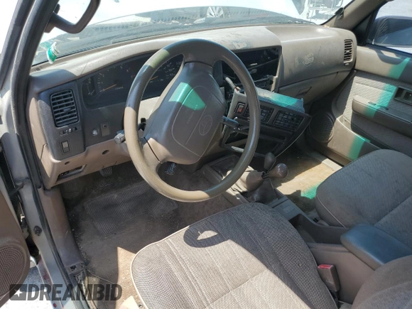 1993 Toyota Pickup DLX z VIN 4TAVN13D3PZ113874, wystawiony jako Copart lot #65384333 z przebiegiem 225 463 mil mil oraz Szkoda całkowita • Salvage title. Historia ofert i sprzedaży dostępna na DreamBid. Obrazek 8.