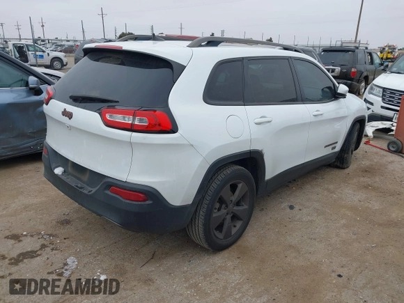 2016 Jeep Cherokee Latitude with VIN 1C4PJLCB0GW350567, listed as a IAAI auction lot 41624430 with 100,371 mi miles. Bid and sale history available at carsss.com. Image 4.