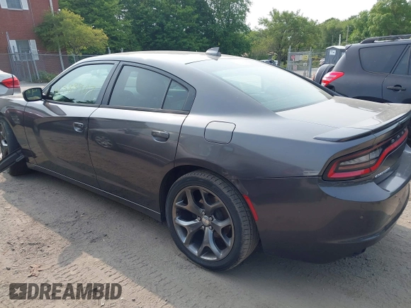 2015 Dodge Charger SXT with VIN 2C3CDXHGXFH897395, listed as a IAAI auction lot 42383907 with 145,334 mi miles and . Bid and sale history available at DreamBid. Image 3.