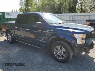 2015 Ford F-150 XLT with VIN 1FTEW1EP7FKE12574, listed as a Copart auction lot 59519985 with 133,337 mi miles and Salvage title. Bid and sale history available at DreamBid. Image 4.