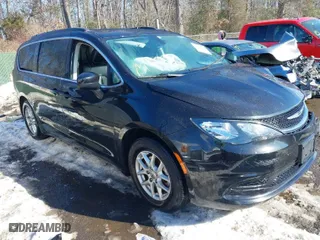 2021 Chrysler Voyager LXI with VIN 2C4RC1DG0MR506659, listed as a IAAI auction lot 41244151 with 121,350 mi miles. Bid and sale history available at carsss.com. Image 1.