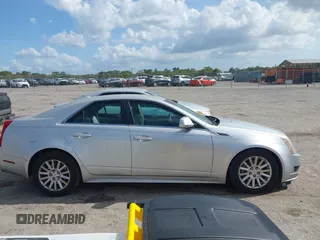 2010 Cadillac CTS with VIN 1G6DA5EG9A0128758, listed as a IAAI auction lot 41958677 with 156,088 mi miles and . Bid and sale history available at DreamBid. Image 13.