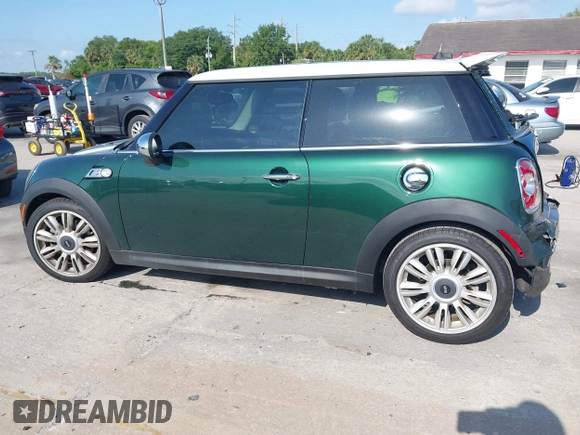 2012 MINI Hardtop S with VIN WMWSV3C50CT388026, listed as a IAAI auction lot 42093542 with 51,308 mi miles and . Bid and sale history available at DreamBid. Image 14.
