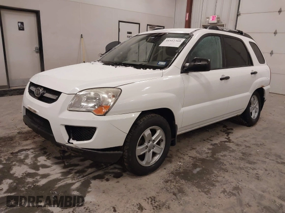 2010 Kia Sportage LX with VIN KNDKGCA35A7718764, listed as a IAAI auction lot 41512368 with 122,420 mi miles and . Bid and sale history available at carsss.com. Image 2.
