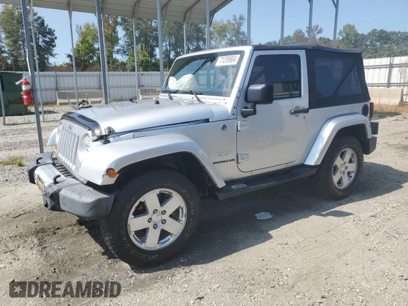 2009 Jeep Wrangler Sahara with VIN 1J4FA54119L747068, listed as a Copart auction lot 71209904 with 86,978 mi miles and Salvage title. Bid and sale history available at DreamBid. Image 1.