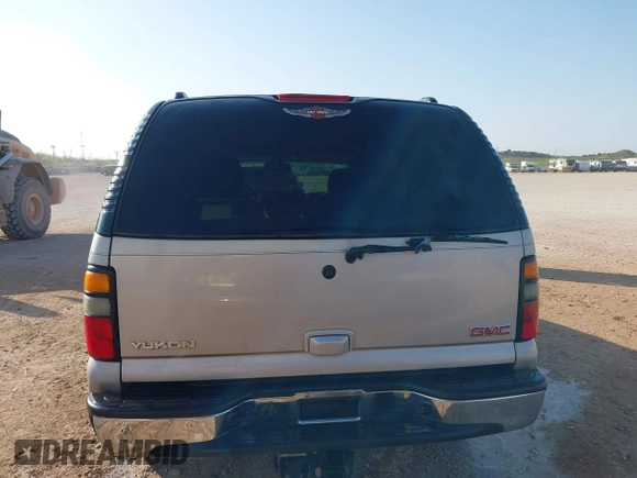 2005 GMC Yukon SLT with VIN 1GKEK13T95R203827, listed as a IAAI auction lot 41815086 with 136,671 mi miles. Bid and sale history available at carsss.com. Image 16.