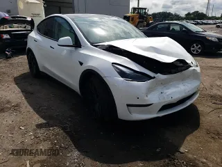 2022 Tesla Model Y Performance z VIN 7SAYGDEF4NF389191, wystawiony jako Copart lot #61443135 z przebiegiem 70 612 mil mil oraz Szkoda całkowita • Salvage title. Historia ofert i sprzedaży dostępna na DreamBid. Obrazek 13.