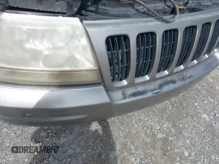 1999 Jeep Grand Cherokee Limited with VIN 1J4GW68N9XC808639, listed as a IAAI auction lot 42521785 with 156,864 mi miles and . Bid and sale history available at DreamBid. Image 12.