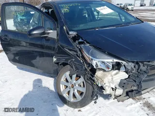 2015 Toyota Yaris L with VIN VNKJTUD34FA055116, listed as a IAAI auction lot 41601874 with 84,508 mi miles. Bid and sale history available at carsss.com. Image 6.